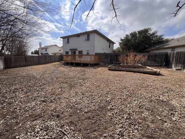 Building Photo - Generous Outdoor Space & Lawn Care Included!