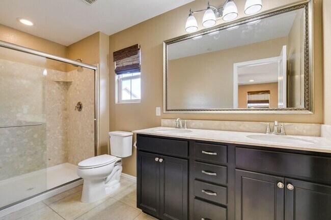 Building Photo - Better Than New with Stunning Designer Upgrades Throughout!