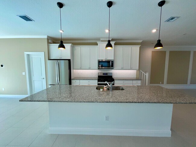 Building Photo - 3/2.5/2 Townhome in Rosette Park at Newfield