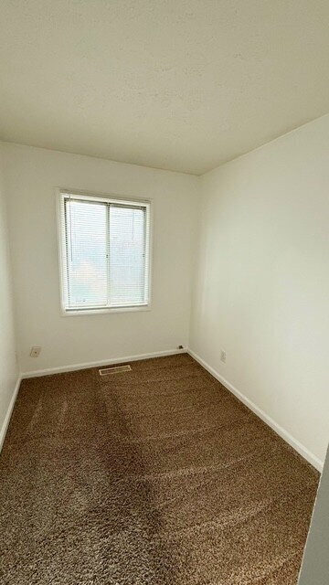 Building Photo - WEST SIDE 4 BEDROOM RANCH AVAILABLE NOW!