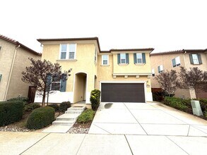 Building Photo - Spacious 5BR + Loft in Hamptons Village – Studio Suite, New HVAC, EV Charging