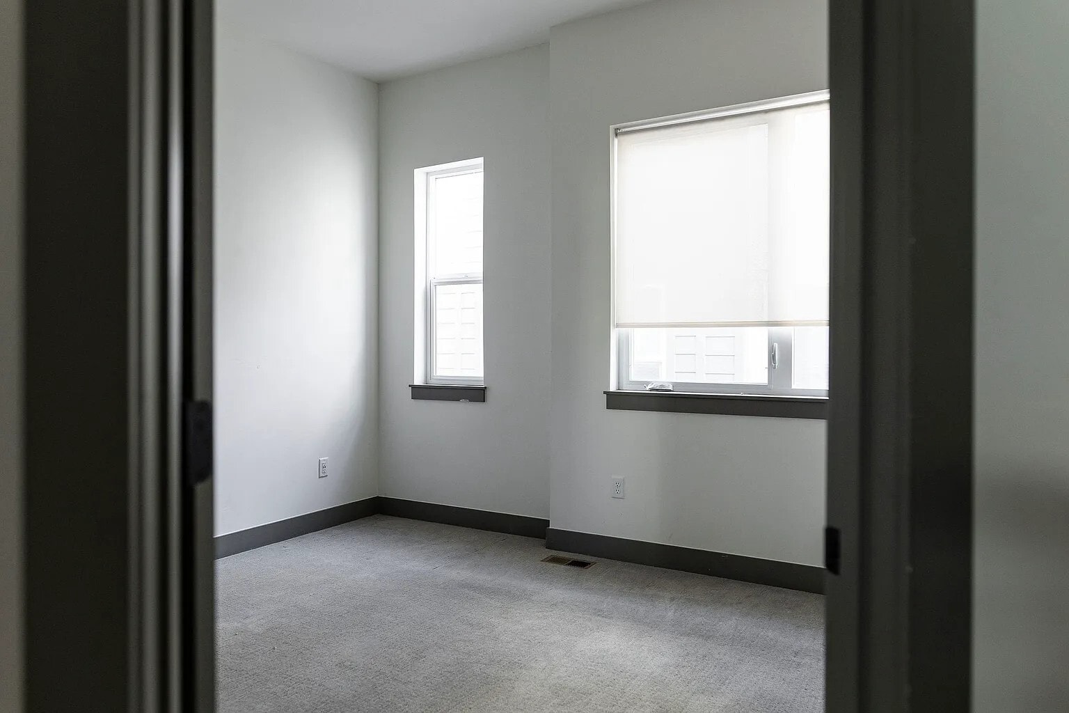 Primary Bedroom featuring an en-suite bathroom and a walk-in closet - 3505 S Marion St