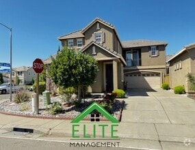 Building Photo - **SOLAR PANELS AND FORMER MODEL HOME!!**