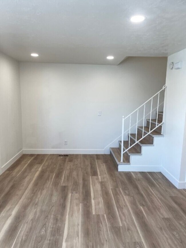 Building Photo - Spacious 3-bedroom 1.5 Bath Twin-Home with a Fenced Backyard