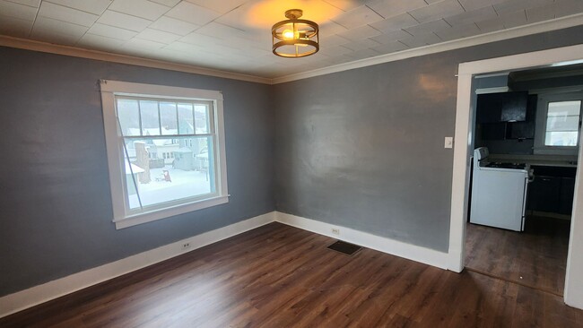 Building Photo - Cozy 3 bedroom Cape Cod with attached garage! First floor offers living room, formal dining, and ...