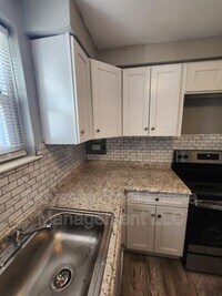 Building Photo - 210 W Spencer Ave