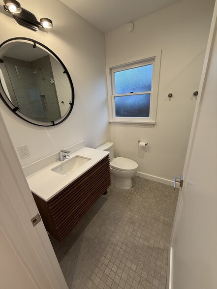2nd Bathroom with Slatted Wood Vanity with Drawers - 1156 S Highland Ave