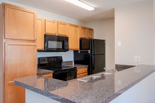 Building Photo - Lake Front 1BR + Den -Move In Special Available