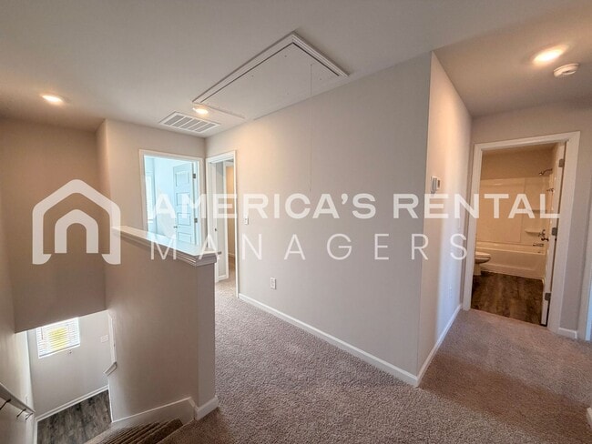 Building Photo - Spacious Two-Story Townhome with Open Layout!