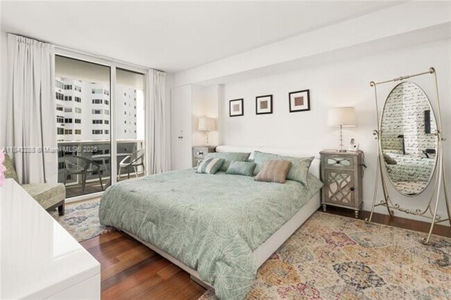 Building Photo - 10275 Collins Ave
