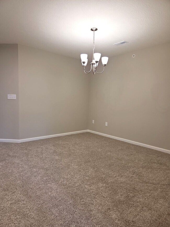 Building Photo - Exquisite just built condo with everything! Ground floor, no stairs, attached garage