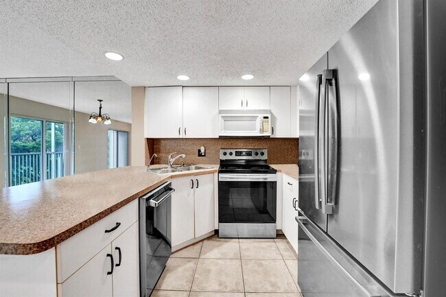 Building Photo - 9470 Tangerine Pl