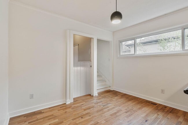 Building Photo - Beautiful, modern 4-bdrm/2-bath home in Concordia—Private, urban sanctuary w/ flex spaces