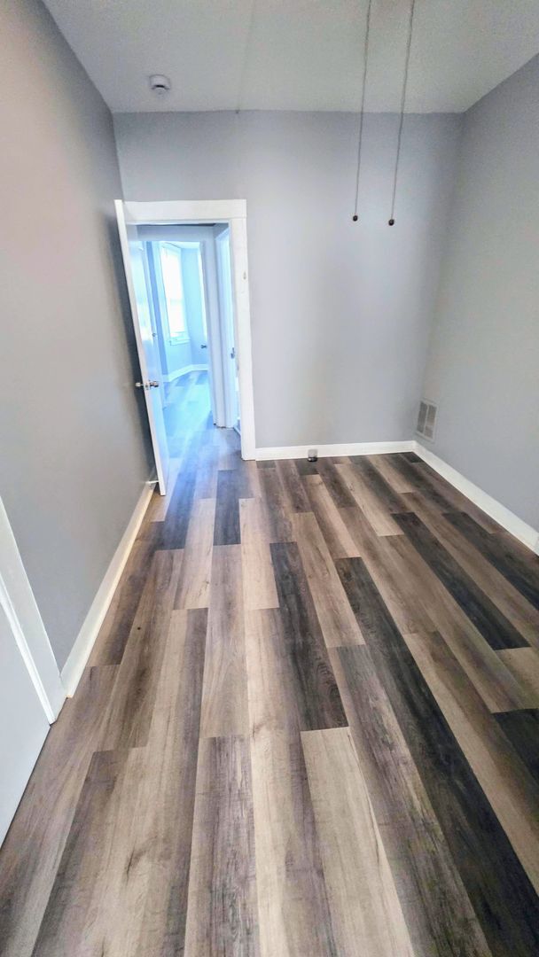 Building Photo - Beautiful Two Bedroom, Plus a Pass Through...