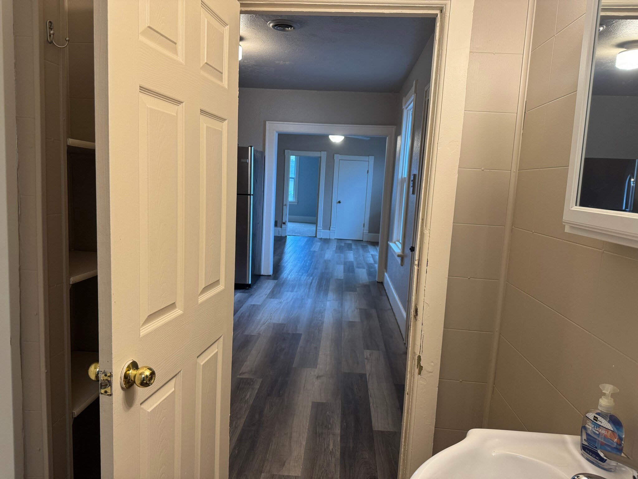 Bathroom into kitchen - 1413 Jefferson Ave