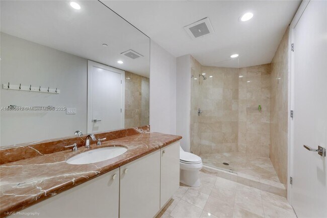 Building Photo - 10225 Collins Ave