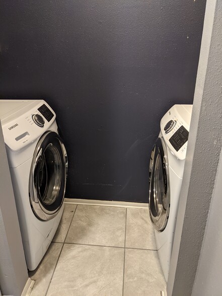 Laundry area with Front Load Washer & Dryer - 2555 Corian Glen Dr