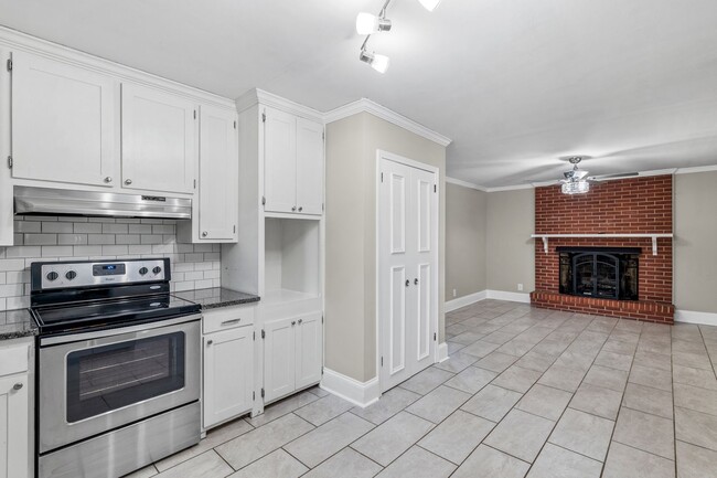 Building Photo - Elon - Large Brick Home, Hardwoods, Granite Counter-Tops, SS Appliances, Fire Place, Carport - Mu...