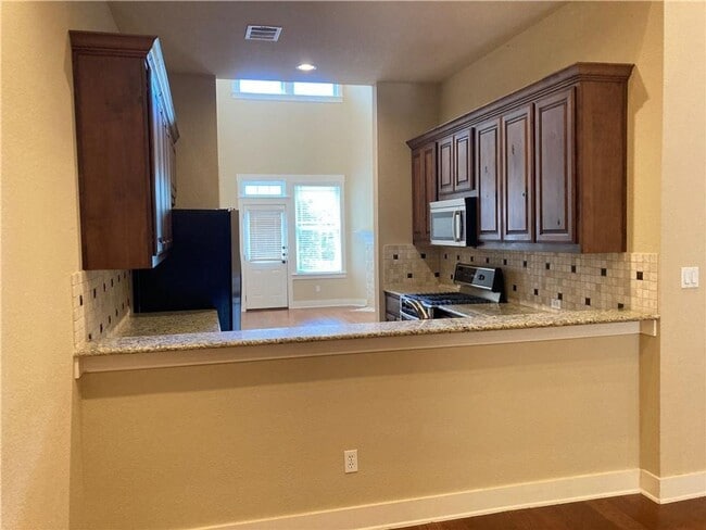 Building Photo - Spacious unit at Sunset Ridge Condos in Tw...
