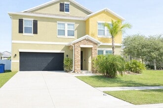 Building Photo - "Spacious 4-Bedroom Oasis with Modern Granite Touches in Land O' Lakes!"