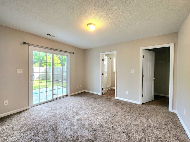 Building Photo - Beautiful 3 bed 2 1/2 bath townhome in a gated community with a pool. Showings Coming Soon!!!