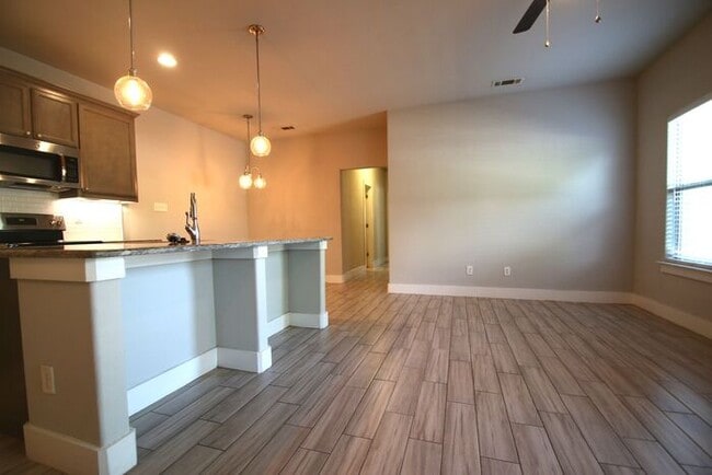 Building Photo - COMING SOON! Modern 3BR/2BA Duplex with 2-Car Garage & Fenced Yard — Fort Worth, TX | Pet Friendly