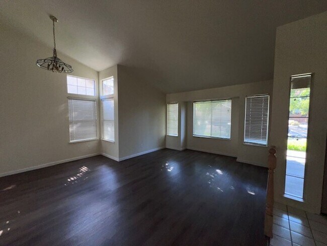 Building Photo - Freshly painted home with new LVP flooring.