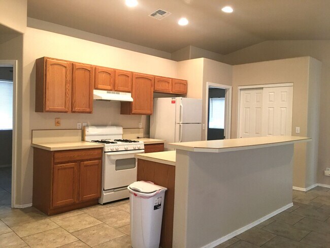 Building Photo - 3-Bedroom Single Family Home with Central Cooling, Attached Garage, and Tile Flooring