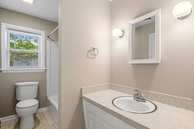 Building Photo - Large Home in Four Seasons Area, Hardwoods, Dining Room, Screed Porch, Fenced!