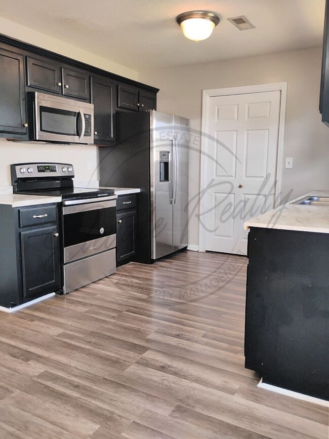 Building Photo - ON SPECIAL! THIS PROPERTY HAS A 1/2 OFF TH...