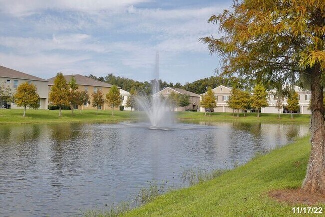Building Photo - Spacious 3/2.5 Townhome with a 2 Car Garage and a Beautiful Pond View in Westwood Condos - Orlando!