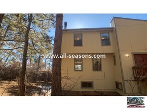 Building Photo - Charming multi-story duplex unit, nestled ...