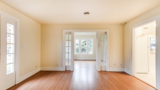 Building Photo - Charming 2 Bedroom 1 Bathroom Bungalow with Oversized 1 Car Garage and Large Manicured  Backyard ...