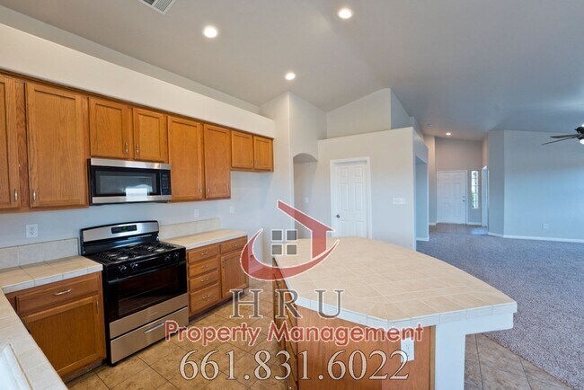 Building Photo - SW-Bakersfield  features 4 bed 2 bath with solar panels