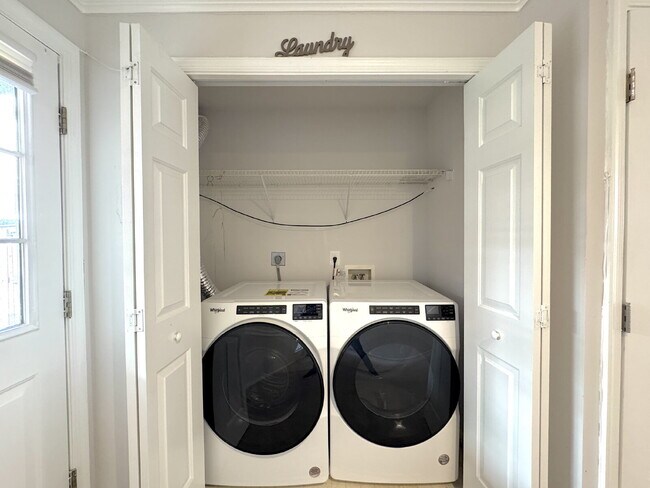 Building Photo - Inviting Suburban Retreat with Spacious Layout and Timeless Hardwood Flooring