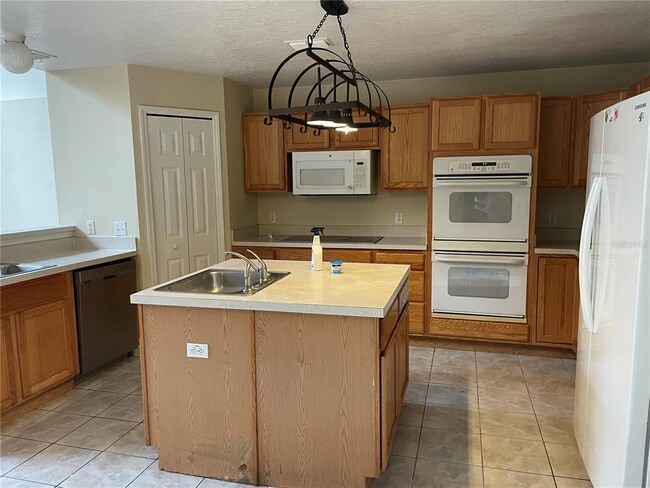 Building Photo - 5064 Spanish Oaks Blvd