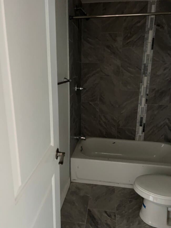 Building Photo - Welcome to this stunning 3-bedroom, 2-bath...
