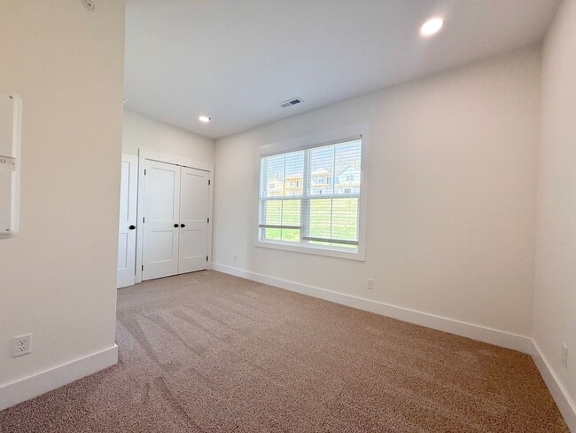 Building Photo - Fuller Style - Spacious 2-Bedroom Townhome with Flex Room at Highbury