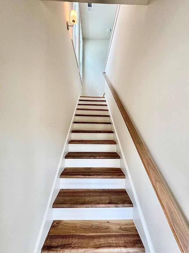 Building Photo - Your Alpharetta Retreat Awaits – Elegant T...