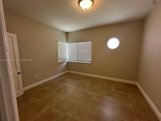 Building Photo - 3235 S Le Jeune Rd