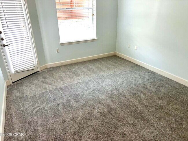 Building Photo - "Spacious 2-Bed Condo with 2.5 Baths on Fr...