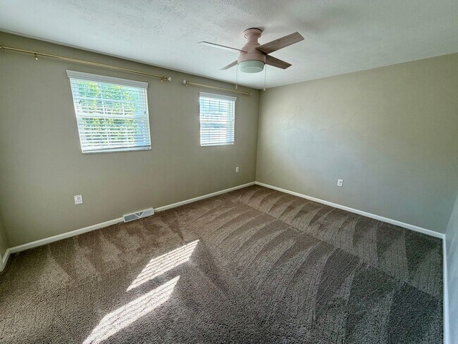 Building Photo - Modern Comforts Await: Spacious Rental with 2-Car Garage, Private Office, and Finished Basement w...