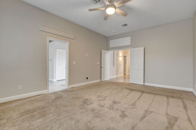 Building Photo - 4 bedroom, 3-bath home with a Pool!
