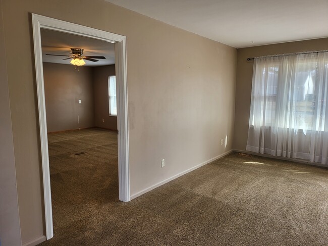 Living Room, door to family room - 1777 Parkway Dr S