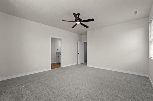 Building Photo - Spacious 4-Bedroom Home with Modern Comforts