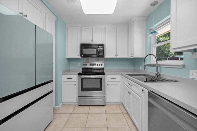 Building Photo - Pace 3BR Home with Bonus Room, Patio Gazeb...