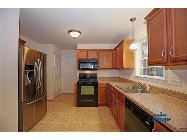 Building Photo - LOVELY 4 BEDROOM MOVE-IN READY HOME IN MID...