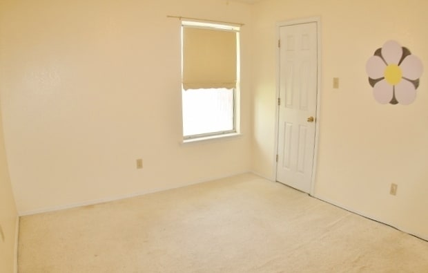 Building Photo - Brick 3 Bedroom Home! Stunning Backyard! M...