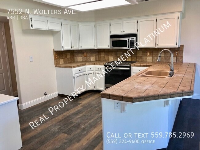 Building Photo - 7552 N Wolters Ave