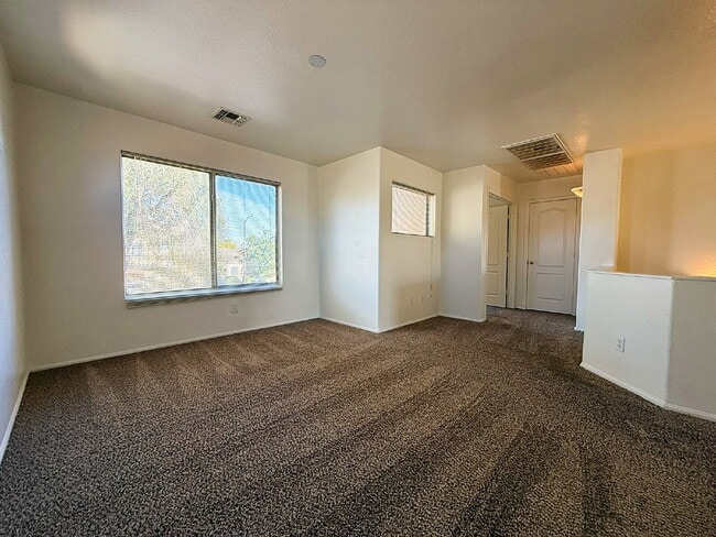 Building Photo - Spacious & Stylish in the Heart of Surprise!